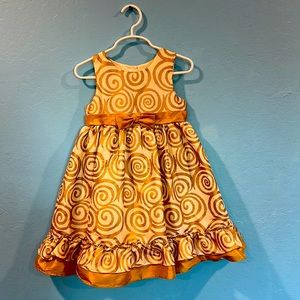 Kids dress in gold color